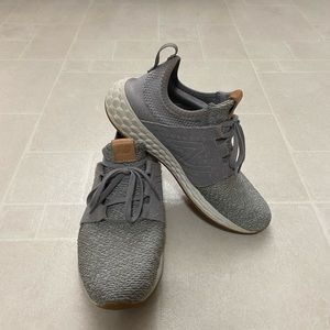 Women’s gray New Balance tennis shoes